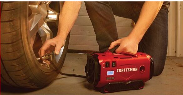 Craftsman Tire Inflator Portable Air Compressor being used